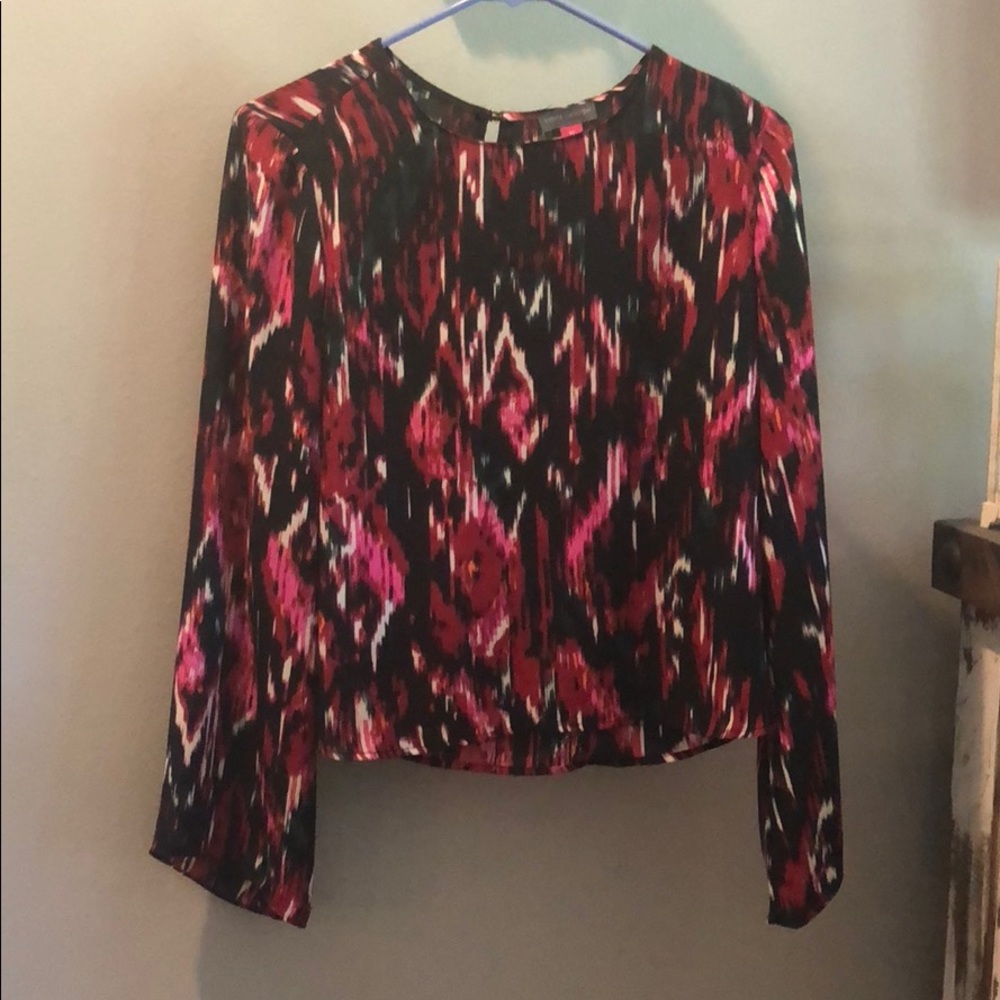 Multi colored flowy blouse.